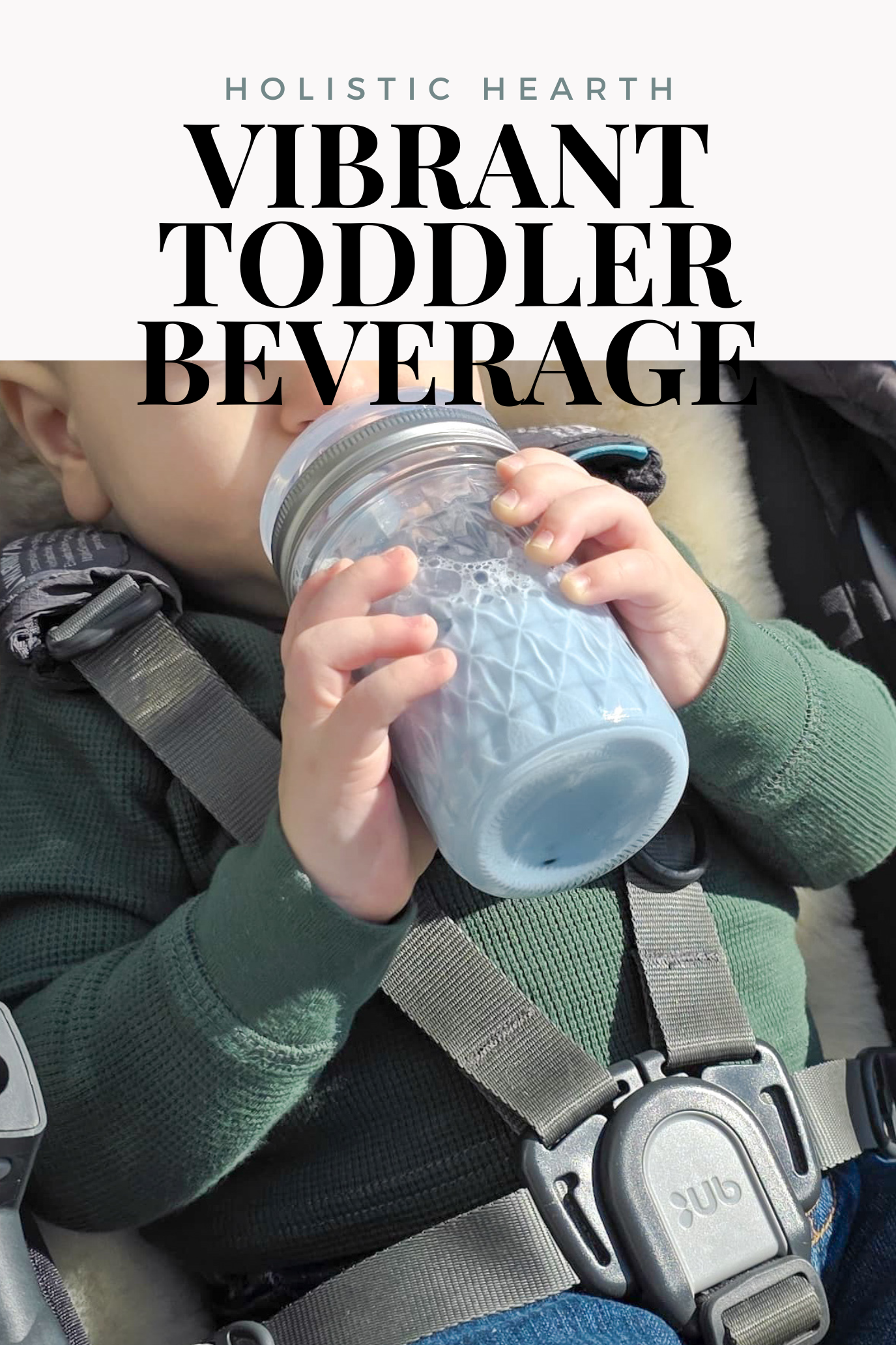 Toddler Holding Blue Spirulina Beverage